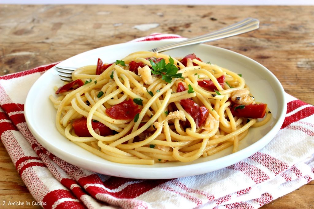 Spaghetti con baccala e pomodori
