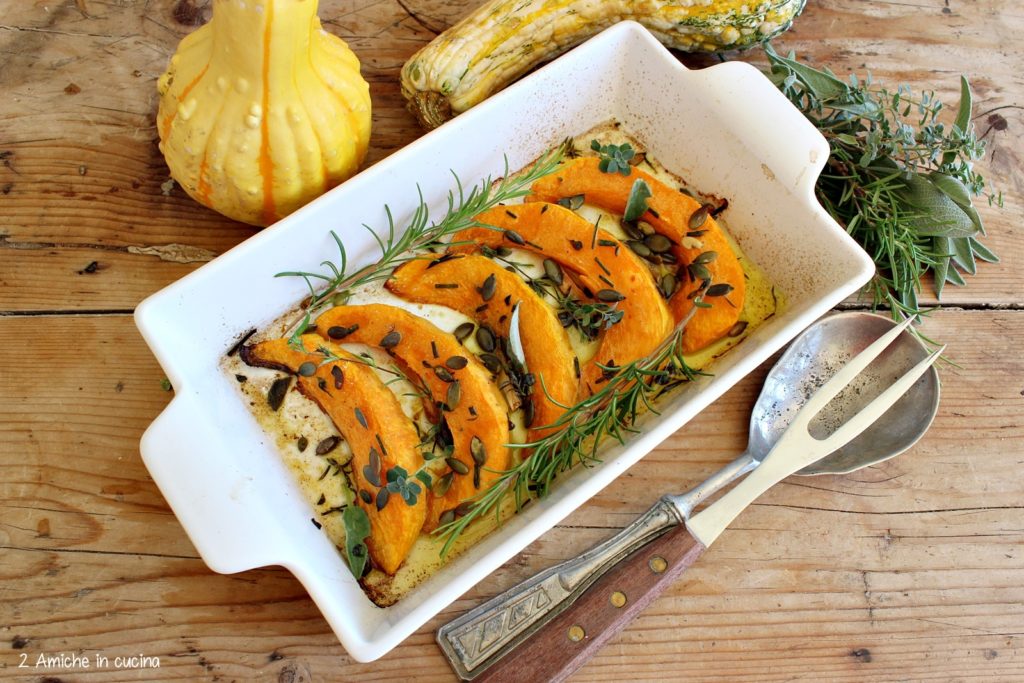 Zucca al forno con erbe aromatiche, semi e olio aromatizzato allo zenzero