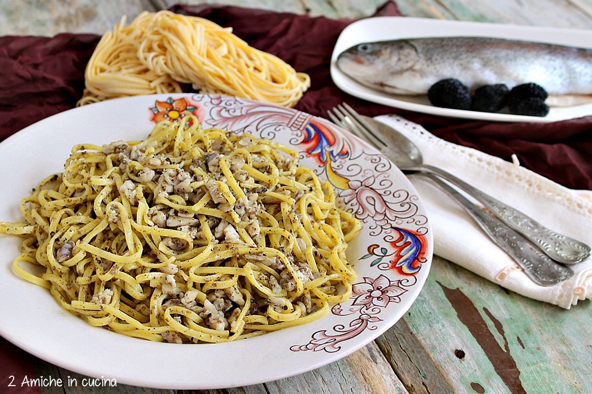 piatto di pasta con tartufo e pesce di fiume
